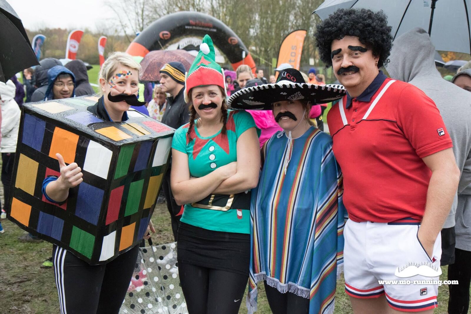 Group of runners dressed up including rubix cube