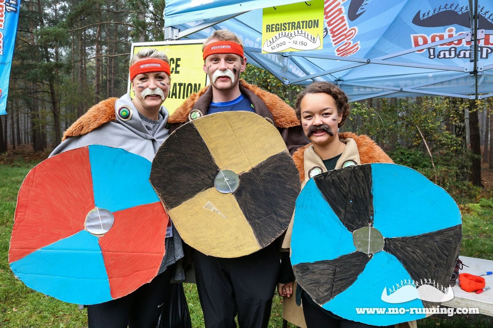 Image of runners dressed up with shields